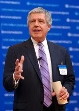 Bill McCracken speaking at a conference